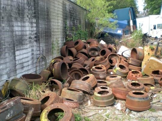 Old, rusted wheel drums. Photo by Sandy Carmony | Lis'Anne Harris