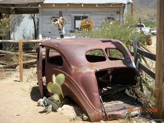 Rusted shell of an old car. Photo by Sandy Carmony | Lis'Anne Harris