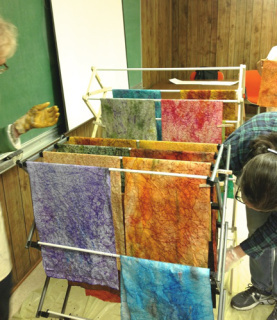 Inked papers drying. Don't they look like fabric?