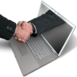Laptop Handshake Image Via Gadgetophilia.com