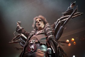 FEEDING TIME: Alice Cooper dons his spider costume.