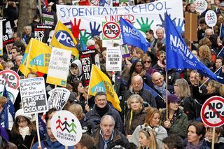 AD75915364Protesters march