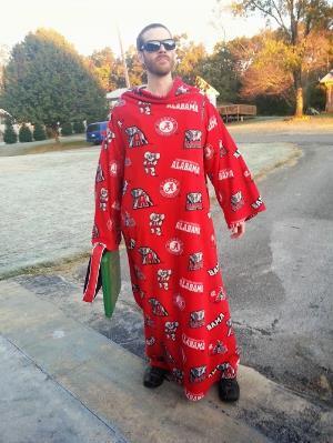 This is what a crazy person wears to a game. (Yes, that's a snuggie, and <br />yes, Dan's tall enough to wear it like a smock)