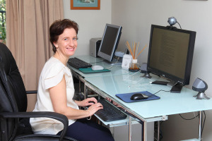 Lynne_at_computer1-web