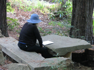 Loren working at the Sacrificial Table. Photo by Sephera Giron.
