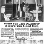 1919 Standard ad, with a maid fixing milady's hair while she sits in a chair in a reasonably spacious bathroom.