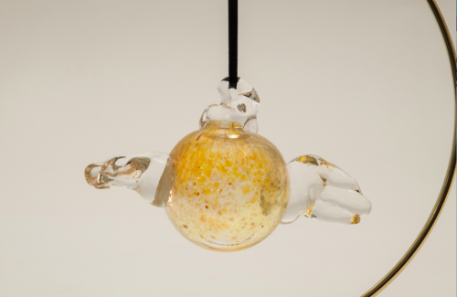 GoldenSnitchGlass 500x325 Kidlit Glass Menagerie: A Delicate Childrens Literature Exhibit