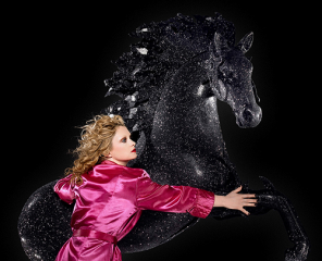 NIGHT MARE: Alison Goldfrapp. of Goldfrapp, hugs a horse.