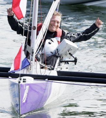 Geoff celebrates the completion of his round-GB challenge