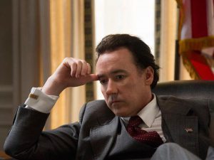 It'll take more than that killjoy frown to turn this handsome fellow into President Nixon.