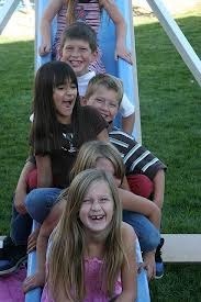 lots of kids on slide
