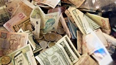 Many different currencies - CC photo by epSos.de