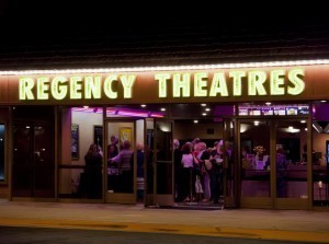 Outside regency Theater at night