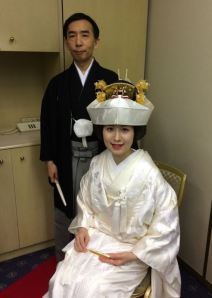 The groom and bride in their traditional Japanese wedding wear.