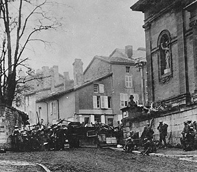 Taken at 10:58 a.m., on Nov. 11, 1918, just before the Armistice went into effect; men of the 353rd Infantry, near a church, at Stenay, Meuse, wait for the end of hostilities. Photo: from Wikipedia