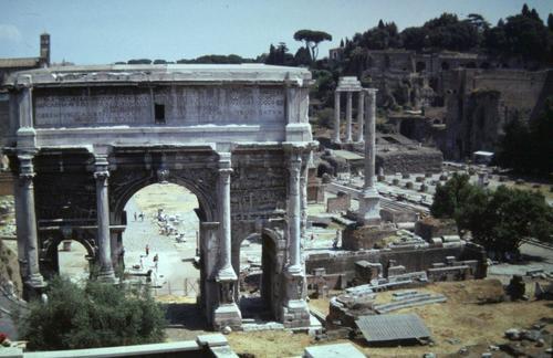 The view from the slope of the Capitoline hill that Aemilius Paullus would have had as he watched the triumphal procession coming along the Sacred Way towards him, only for us obscured by the arch of the emperor Septimius Severus at the head of the forum. In front of the arch are all of the most hallowed places of the forum, including the Rostra, and to the right in this picture are the remains of the Basilica Julia, three columns of the Temple of Vespasian and the foundations of the palatial structures on the Palatine Hill, all of which date later than the time of the triumph when the slopes of the Palatine were occupied by aristocratic houses.Venet's vantage point when he was planning his painting would have been about two hundred metres to the right of where I took this picture, allowing him to see the sequence of monuments visible in the background of his painting.