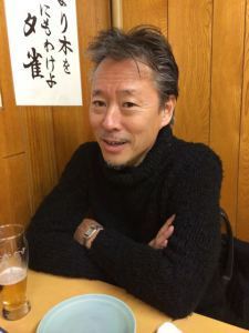 The master of ceremonies: Koji. He paces himself at one skewer per glass of sake.