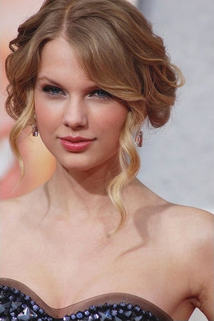 Taylor Swift at the premiere for Hannah Montan...