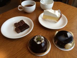 Clockwise from left to right: chocolates from Chocolat de H, cheesecake from Paul Basset, chocolate mousse cake from Sebastien Bouillet, and chocolate and pistachio mousse from Toshi Yoroizuka.