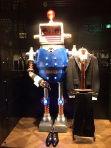 Former employee of the Robot Restaurant, now reduced to working retail.
