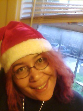 Sumiko Saulson in santa hat