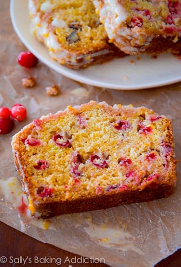 Moist & flavorful cranberry bread packed with orange zest, light cinnamon streusel, and an orange glaze. sallysbakingaddiction.com