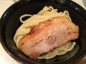 Thick noodles and a slice of pork...