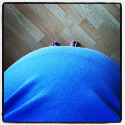 belly at 30 weeks. I can pretend I can't see my toes. only 9 weeks, 63 days, and 9 appointments to go...