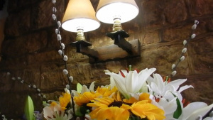 Lamp and flowers in Craig's farmhouse in Mystical Circles (photo credit Abigail Robinson)