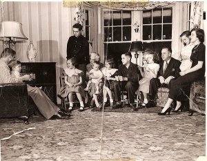 Family Praying The Rosary