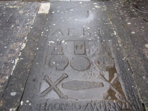 Grave markers on the floor inside the priory