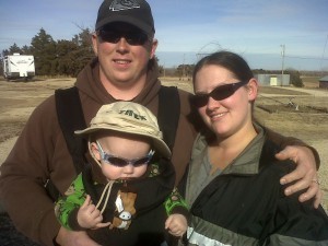 Travis and Heather Sharpe with their gorgeous son.