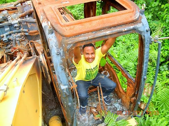 IN THE CAB A PREVIOUSLY CHINESE-OWNED EXCAVATOR ORDERED BURNED BY THE GHANA MILITARY (Photo by Kwame O.)