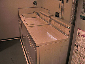 Laundry equipment within a room
