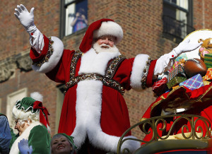 Santa Claus rides on his sleigh down Central Park West during the 86th Macy's Thanksgiving Day Parade in New York