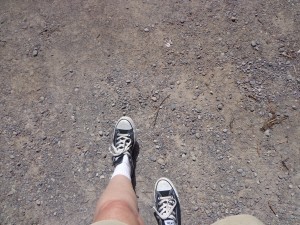 one foot in front of the other