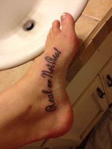 Hunger Games foot tattoo 2