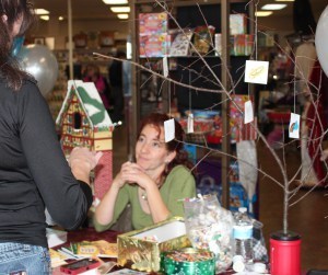 Signing books at Catholic Supply's Small Business Saturday event