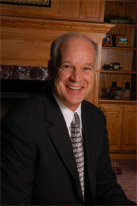 Dr. Del Tackett