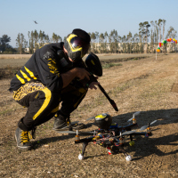 The human sacrifice, posing with his robotic predator just before the hunt.