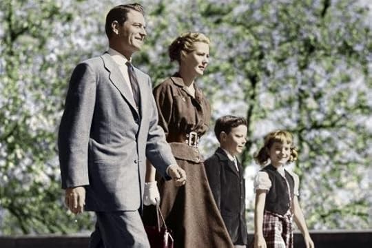 Fifties-style middle-class family on a walk