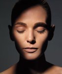 Woman with her eyes closed