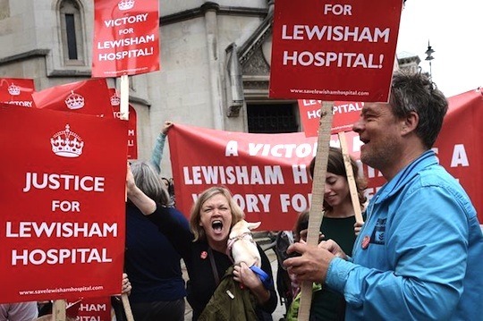 Save Lewisham Hospital cmapaigners celebrate victory outside the High Court on July 31, 2013 (Photo: PA).
