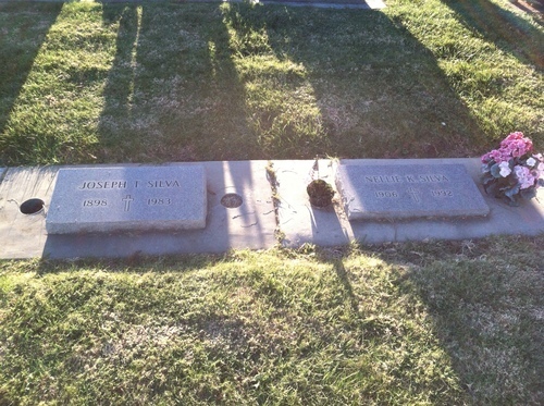 It took me way too long to find my grandparent's graves. I said hello and <br />spent some time wondering and feeling grateful that someone had left Nanny <br />flowers. But what about Poppy? Where were his?