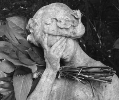 Statue of a sad woman