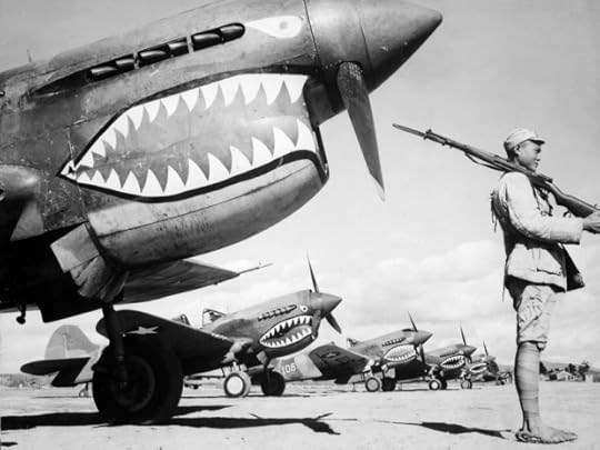 Chinese soldier guarding a Flying Tigers P-40; Wikimedia Commons