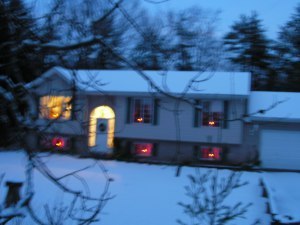 Our house, last year...we still hope for snow this year.