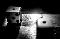 A pair of dice showing ones