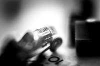 Racing car and houses from the board game Monopoly. These are from a 1960s USA edition