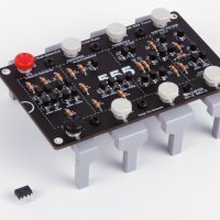 This thing is a giant chip! Not a disproportionate Dorito (nor even a tremendous Tostito), but a giant integrated circuit, or IC. These little 